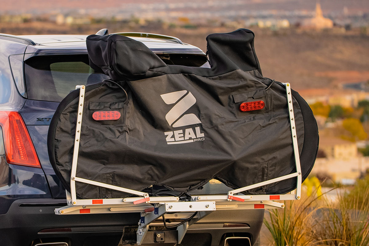Bike cover installed on rear vehicle bike rack